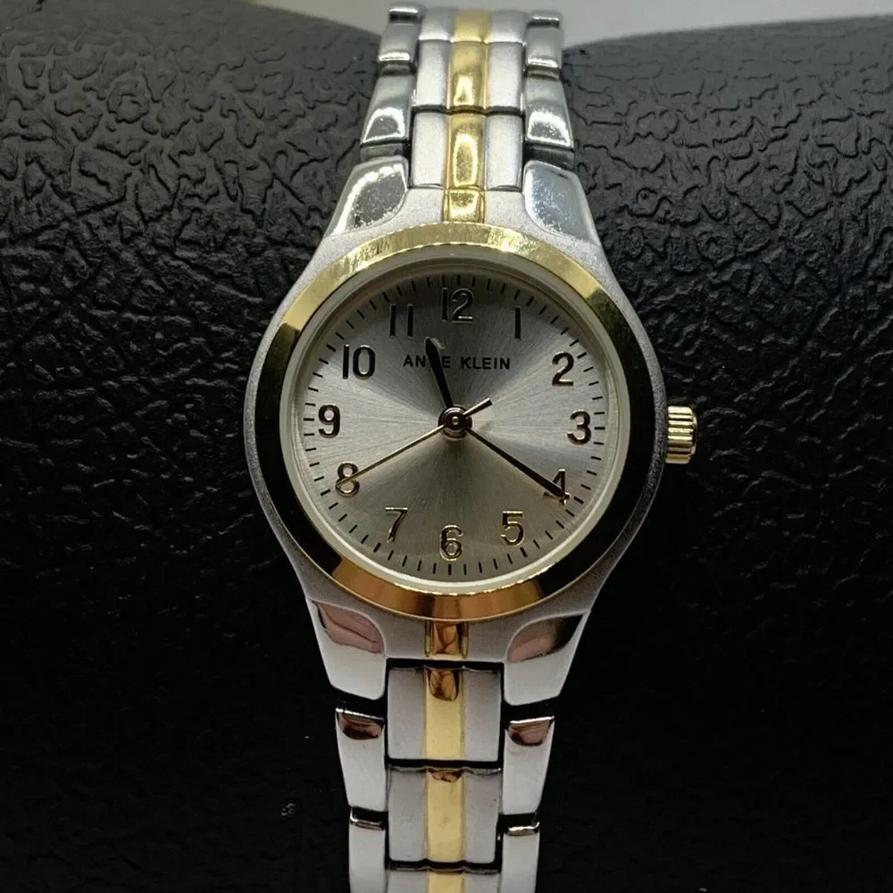 Anne Klein 10-5491SVTT Women's Stainless Steel Analog Silver Dial Watch MGK19